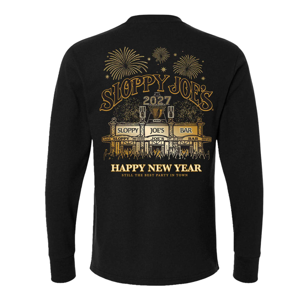 Back of a black Sloppy Joe’s 2027 New Year’s Eve long sleeve tee with gold artwork of fireworks over the bar, a conch shell drop and countdown clock, a cheering crowd, and “Happy New Year, Still the Best Party in Town”